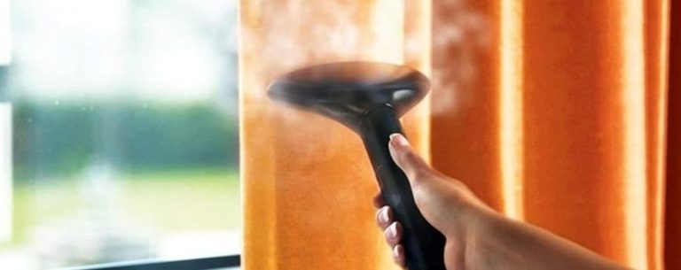 clean curtains with a steam cleaner